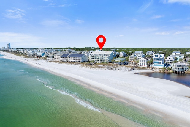 aerial view with a view of the beach and a water view