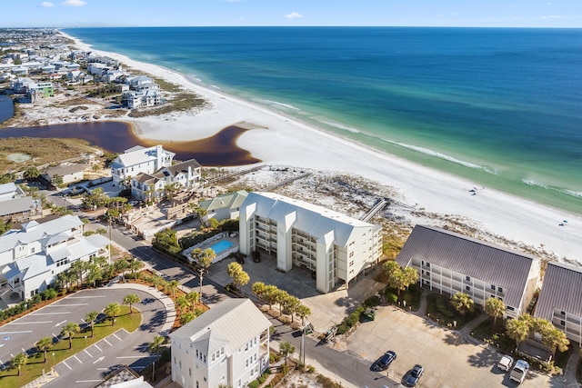 aerial view featuring a water view and a view of the beach