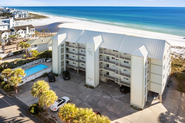 drone / aerial view with a view of the beach and a water view