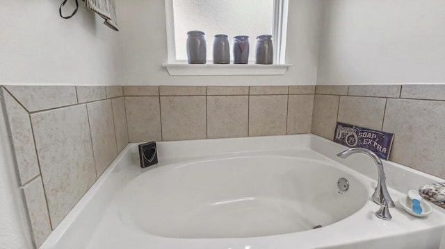 bathroom featuring a garden tub