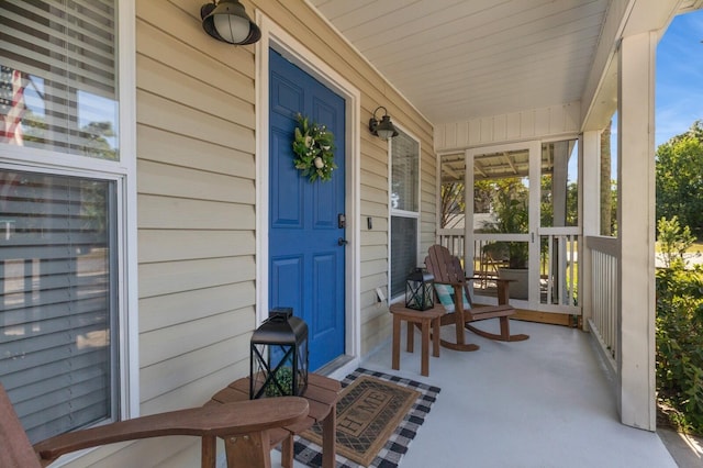 entrance to property with covered porch