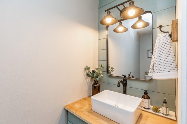 bathroom with hardwood / wood-style flooring and vanity