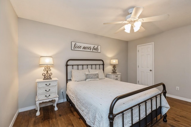 bedroom with ceiling fan and dark hardwood / wood-style floors