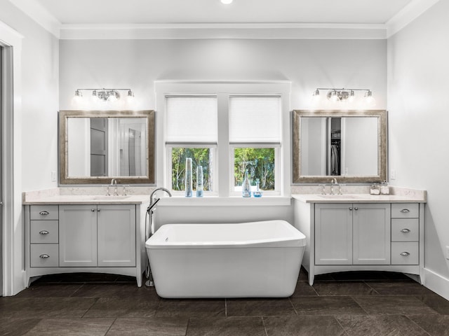 968 Don Bishop Rd, Santa Rosa Beach, FL 32459 - bathroom featuring crown molding, a freestanding bath, and two vanities