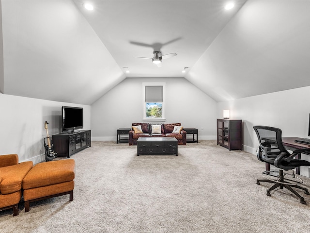 office area with ceiling fan, vaulted ceiling, and carpet floors