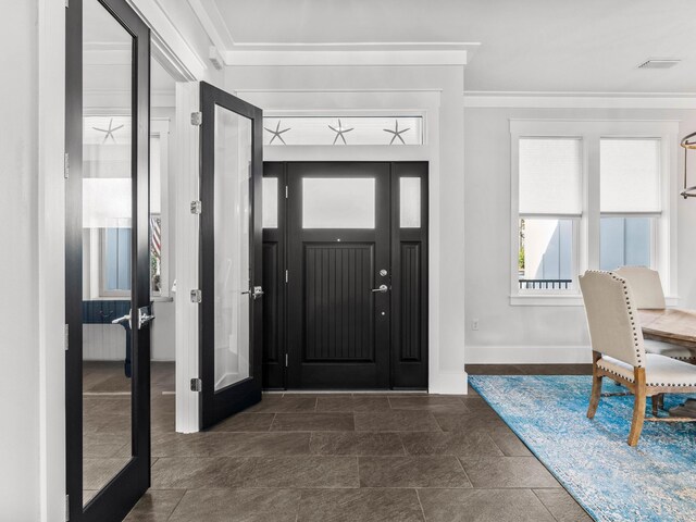 foyer with ornamental molding