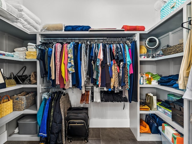 spacious closet featuring tile patterned floors