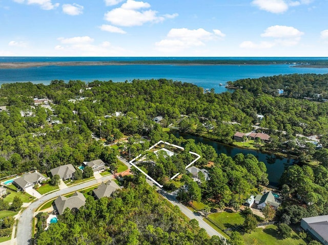 birds eye view of property featuring a water view