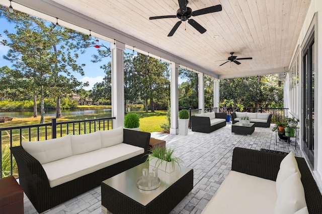 968 Don Bishop Rd, Santa Rosa Beach, FL 32459 - view of patio with an outdoor living space, a water view, and a ceiling fan
