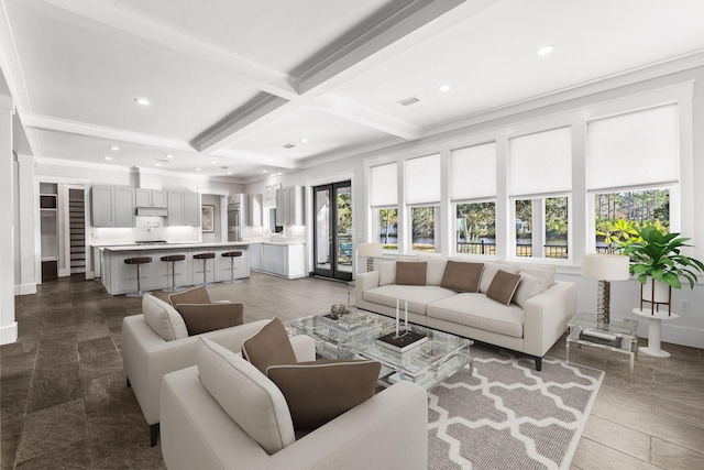 living room with crown molding, beam ceiling, and coffered ceiling