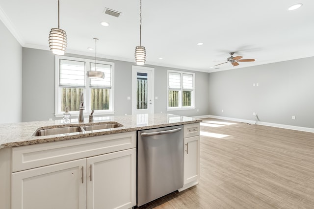 kitchen with white cabinets, sink, stainless steel dishwasher, light stone countertops, and light wood-type flooring