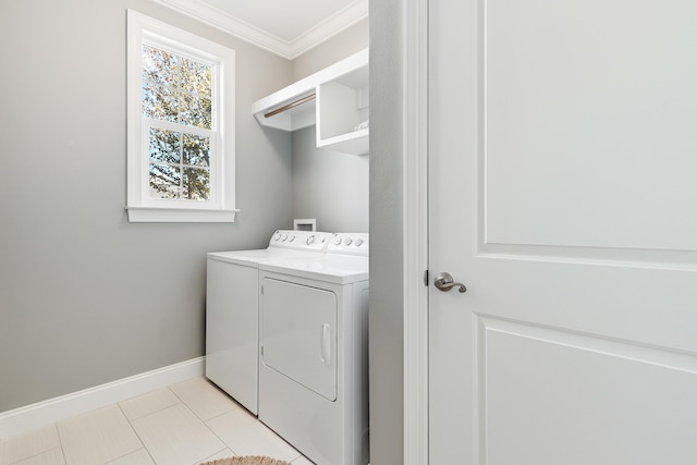 laundry room featuring light tile patterned flooring, independent washer and dryer, and ornamental molding