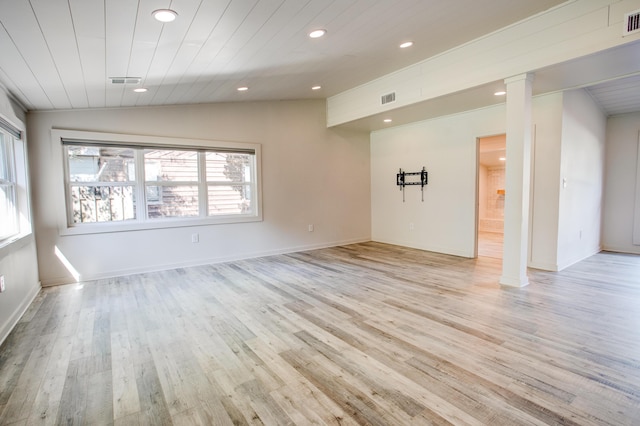 interior space featuring wooden ceiling, light hardwood / wood-style floors, and lofted ceiling