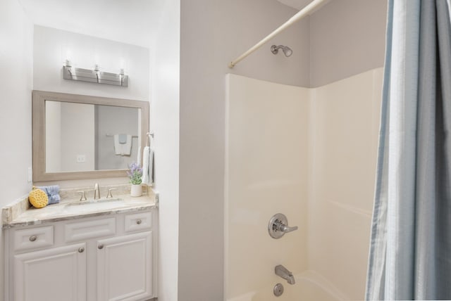 bathroom with shower / bath combination with curtain and vanity