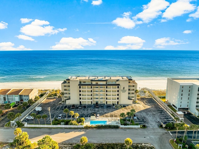 bird's eye view with a beach view and a water view