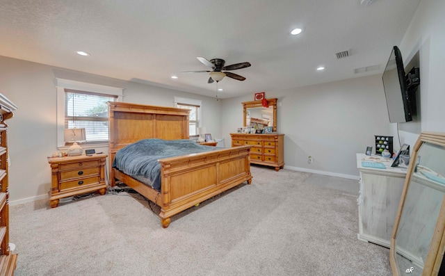 carpeted bedroom with ceiling fan