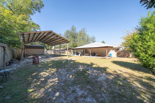 view of yard featuring a carport