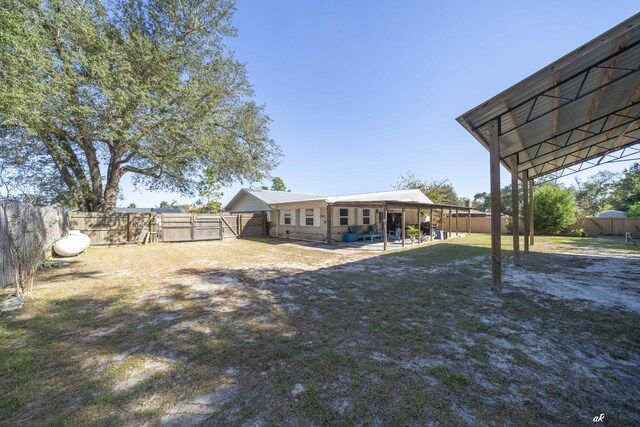 248 Sukoshi Dr, Panama City, FL 32404 - fenced backyard featuring a patio area
