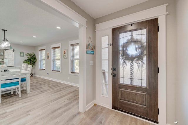 foyer entrance featuring light wood-type flooring