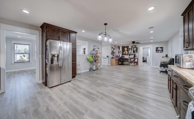 248 Sukoshi Dr, Panama City, FL 32404 - kitchen featuring appliances with stainless steel finishes, dark brown cabinetry, baseboards, recessed lighting, and light countertops