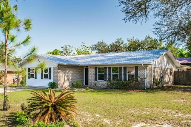 248 Sukoshi Dr, Panama City, FL 32404 - ranch-style home with brick siding