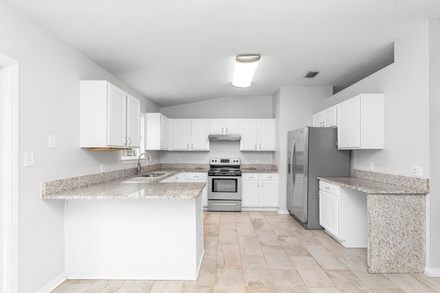 kitchen with stainless steel appliances, sink, vaulted ceiling, white cabinets, and kitchen peninsula