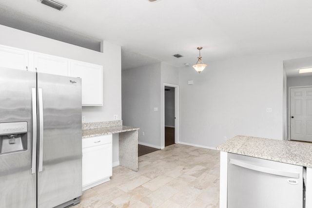 kitchen with white cabinetry, decorative light fixtures, and appliances with stainless steel finishes