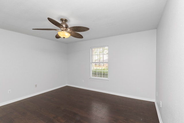 unfurnished room featuring ceiling fan and dark hardwood / wood-style floors