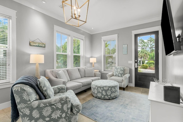 tiled living room featuring an inviting chandelier, a healthy amount of sunlight, and crown molding