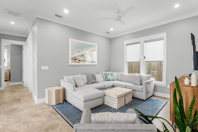 living room with ceiling fan, light tile patterned floors, and ornamental molding