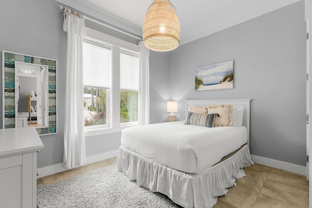 tiled bedroom featuring ornamental molding