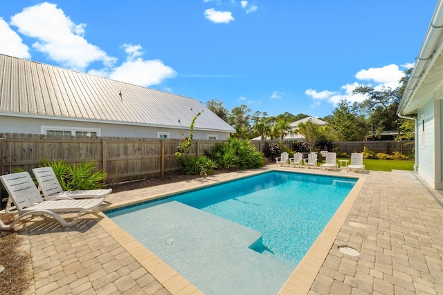 view of pool with a patio area