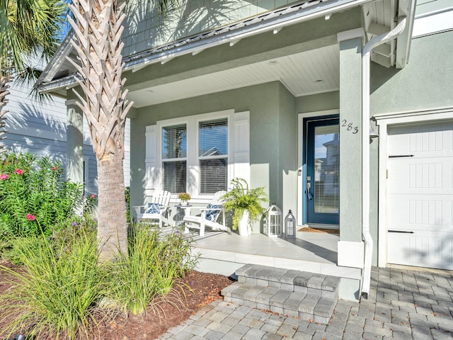 entrance to property with covered porch