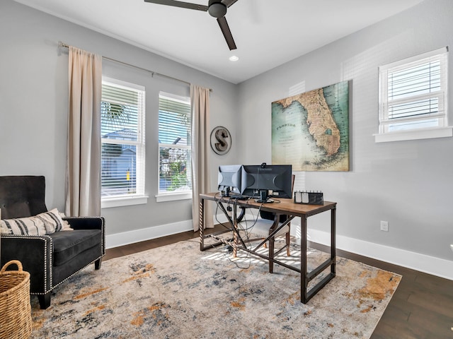 office area with dark hardwood / wood-style flooring and ceiling fan