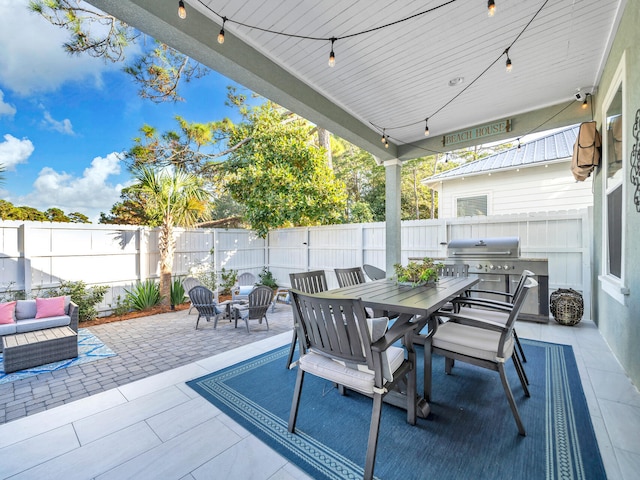 view of patio featuring a grill