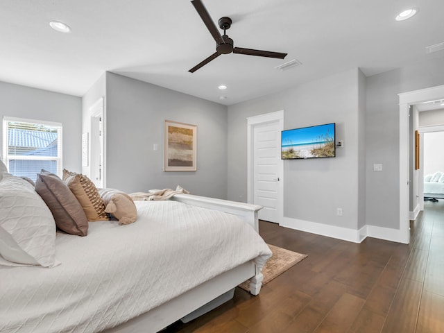 bedroom featuring ceiling fan and dark hardwood / wood-style floors