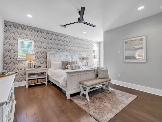 bedroom with dark wood-type flooring and ceiling fan