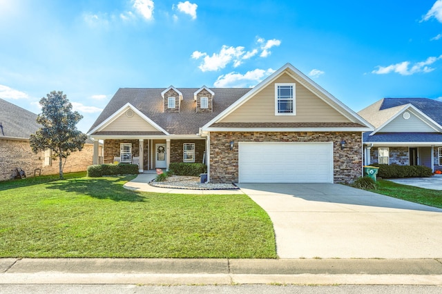 view of front of property featuring a porch, a front lawn, and a garage