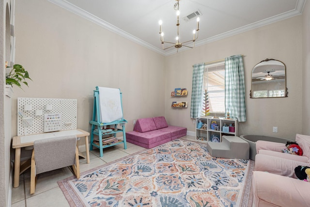 sitting room with ceiling fan with notable chandelier, light tile patterned floors, and crown molding