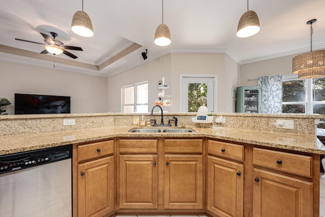 kitchen with stainless steel dishwasher, hanging light fixtures, sink, and crown molding