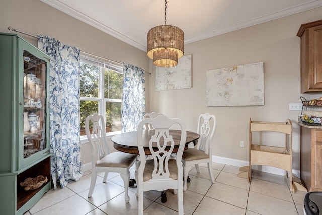 dining room featuring light tile patterned floors and ornamental molding