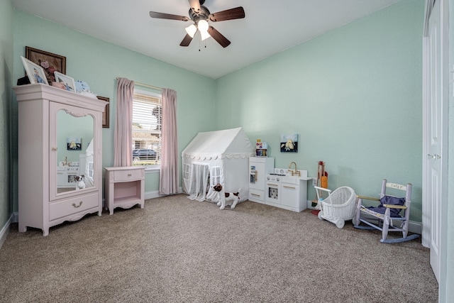 game room featuring ceiling fan and carpet