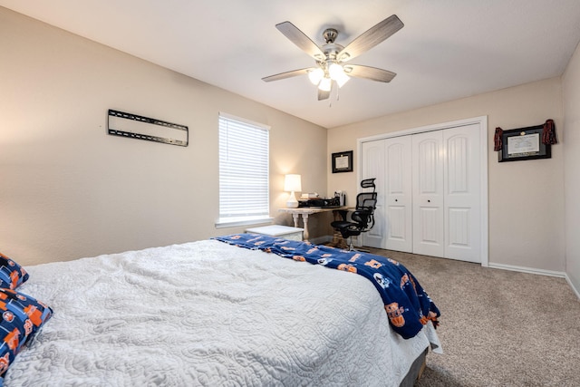 carpeted bedroom with a closet and ceiling fan