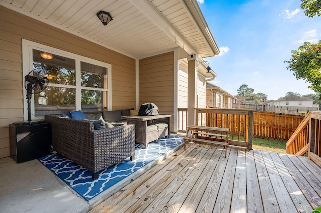 wooden terrace featuring outdoor lounge area