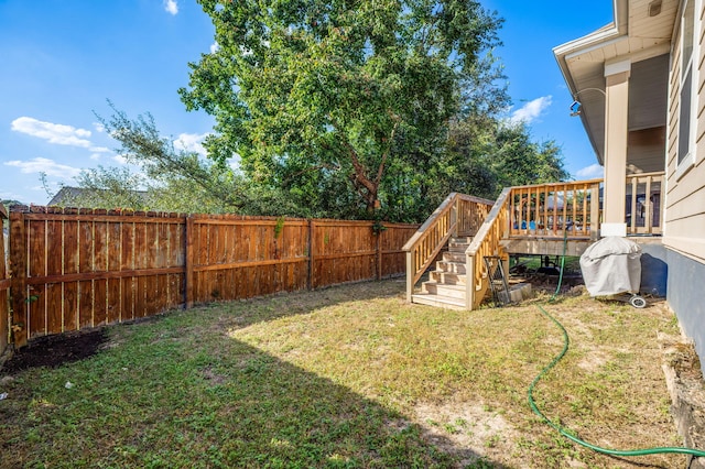 view of yard with a deck