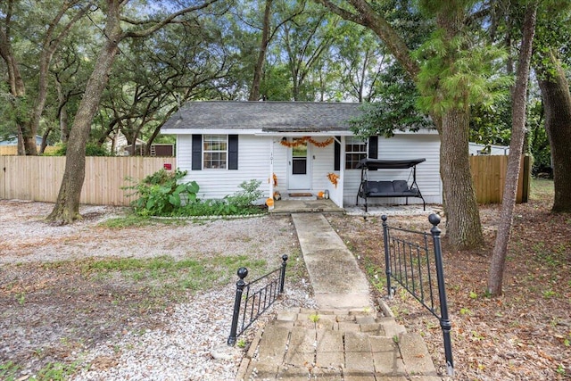 single story home featuring a hot tub