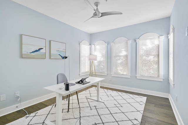 home office featuring wood-type flooring and ceiling fan