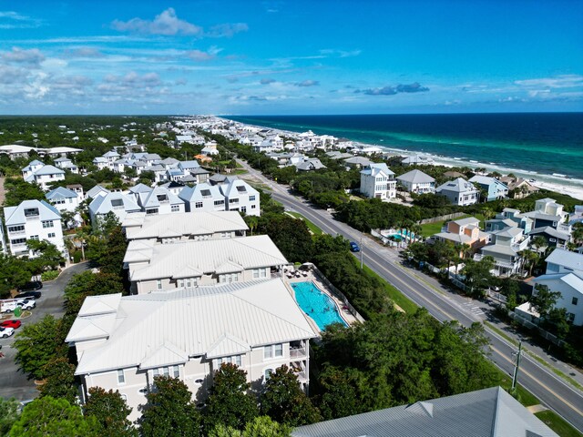 aerial view featuring a view of the beach and a water view