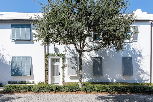 45 N Charles St, Inlet Beach, FL 32461 - view of front of home with stucco siding