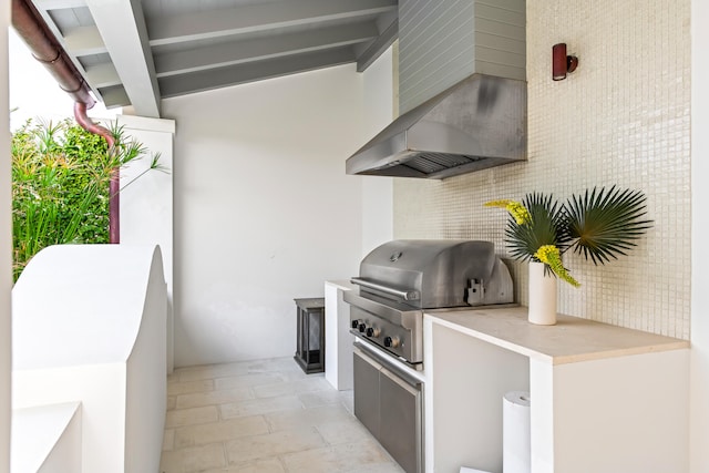 view of patio featuring a grill and exterior kitchen